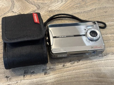 Cámara digital compacta Praxis DC Slim 5 5,0 MP plateada y estuche - Probada Foto 1 de 4