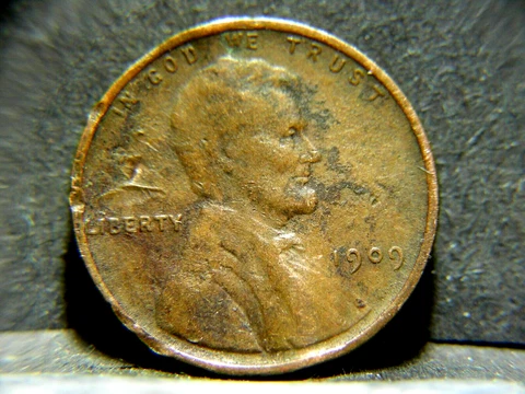 1909 Wheat Penny Error--Struck Through Grease on Reverse--Split Planchet--#456 Cover