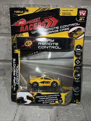 RC POCKET RACER FURY WITH 4 WAY REMOTE CONTROL / CHARGING STATION - Image 1 of 4