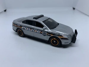 Matchbox - Ford Taurus Police Interceptor 70 Years - MINT LOOSE - Diecast - 1:64 - Picture 1 of 2