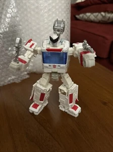 Hasbro Transformers War for Cybertron Ratchet Deluxe Class - Bild 1 von 1