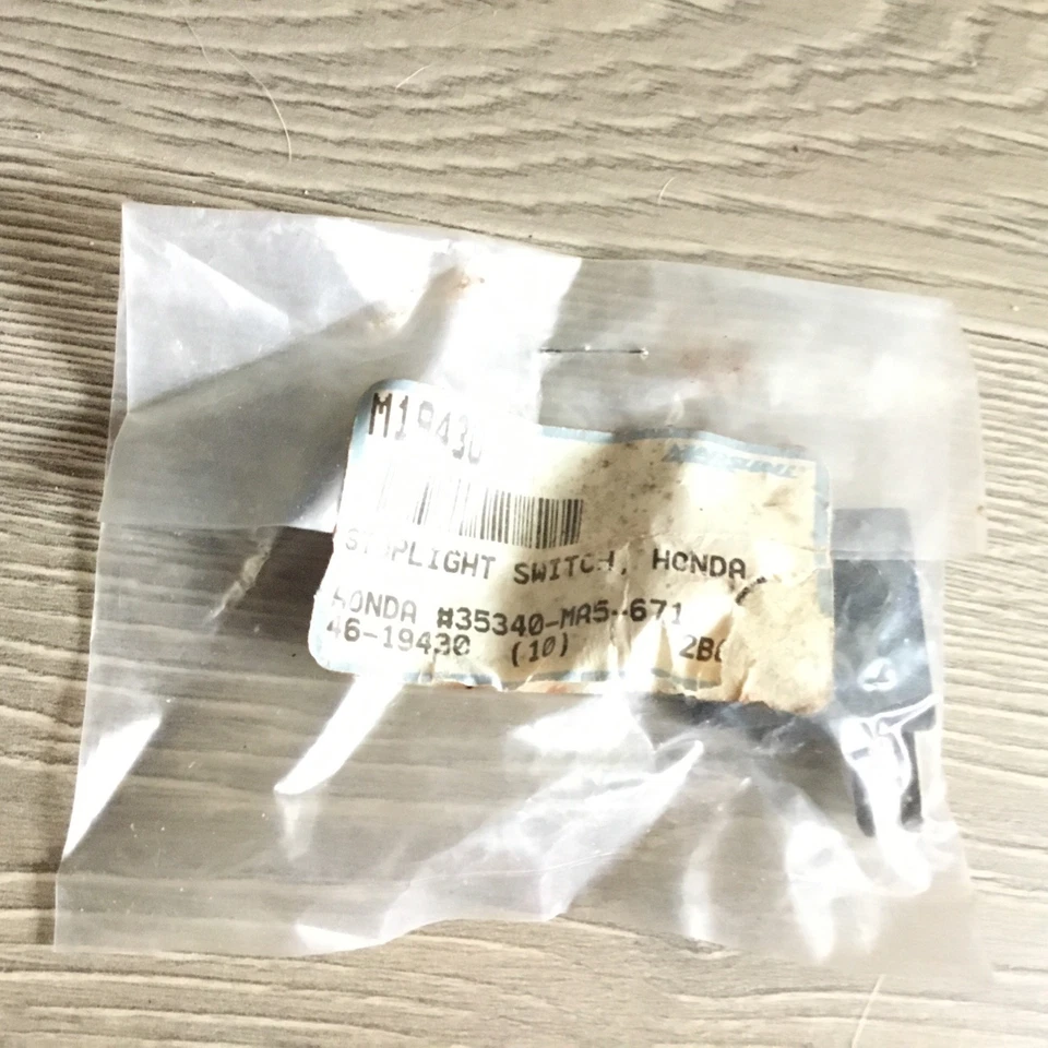 Interruptor de parada de luz de freno auténtico genuino OEM HONDA 35340-MA5-671 cantidad 1 Foto 1 de 4