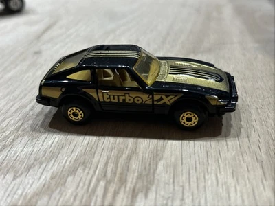 Matchbox Datsun 280ZX 2+2 Turbo Puertas Negras Abiertas 1/64 Diecast De Colección 1982 Como Nuevo Foto 1 de 4