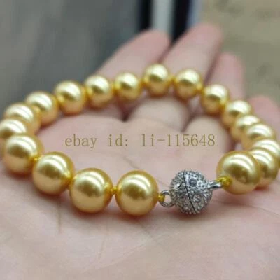Elegante pulseira de contas de pedra preciosa redonda pérola concha amarela 10 mm presente feminino 7,5" - Imagem 1 de 2