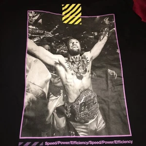 RARE CONOR MCGREGOR UFC FOCUS FUELS CHAMPIONS SHIRT XL MMA NEW INDITEX BERSHKA - Picture 1 of 8