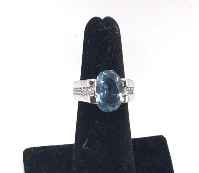 Lia Sophia "Aquarius" Blue Center Stone, CZ Baguette, Silver Statement Ring Sz 5 - Image 1 of 4