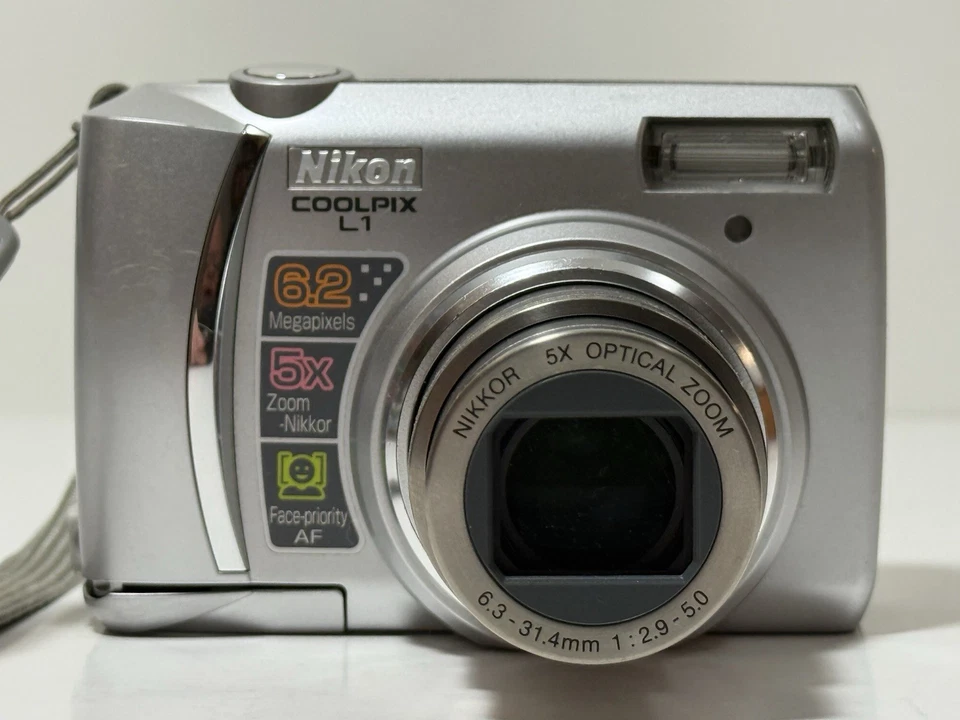 Nikon COOLPIX L1 6.2MP Digital Camera Silver Tested - No SD Card - Image 1 of 4