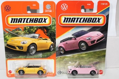 MATCHBOX #52 and #118 2019 Volkswagen Beetle Convertible Yellow & Pink Set of 2 - Image 1 of 3