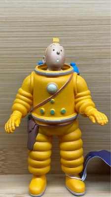 Boneco The Adventures of Tintin 232 cor amarelo tamanho 7,8cm altura usado - Imagem 1 de 4