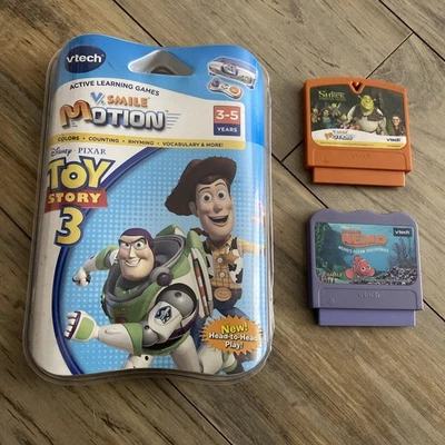 Toy Story 3 Vtech V.Smile Motion Active Learning Games Cart NEW Lot of 3 - Image 1 of 2