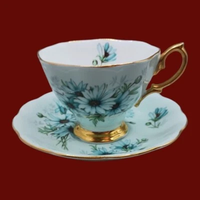Taza de té y platillo Royal Albert con margaritas azules adorno dorado Foto 1 de 4