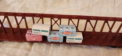 Ho Scale Wrapped Lumber Loads Dow, Weyerhaeuser  and  Pink Panther.  LOT -3 - Image 1 of 2