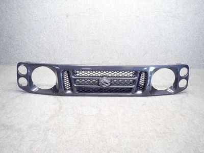 Rejilla delantera genuina Suzuki Jimny JA22 JA22W 72111-82CA0 OEM JDM Samurai Santana Foto 1 de 4