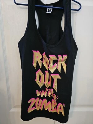 Camiseta sin mangas Zumba talla S espalda cruzada dorada brillo seminueva en gran forma rara  Foto 1 de 4