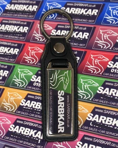 SARBKAR KEYRING - SAAB 9-3 9-5 LEATHER SEATS BELTS BUCKLES ARM REST DOOR CARDS - Picture 1 of 1