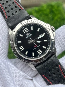 Orologio da polso uomo vintage Orient SP UNE2-C0-B quadrante nero made in Japan quarzo - Foto 1 di 12