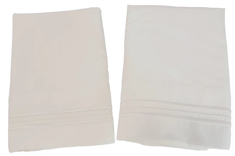 2 hermosas fundas de almohada blancas con bordado blanco. Microfibra King 20 X 39 Foto 1 de 4