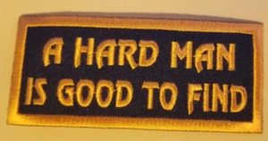 UN UOMO DURO È BUONO DA TROVARE toppa ricamata circa 1,75x3,75" arancione - Foto 1 di 2