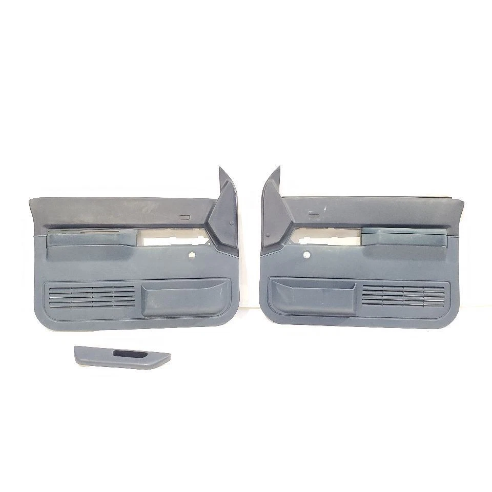 GMC C1500 OBS 1988 OEM par de paneles de moldura de puerta interiores manuales  Foto 1 de 4