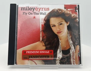 Miley Cyrus - Fly on the Wall - Bild 1 von 3