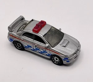 Matchbox Subaru Impreza WRX 2007 Police Car Diecast 1:64 Silver w/ Light Bar - Picture 1 of 6
