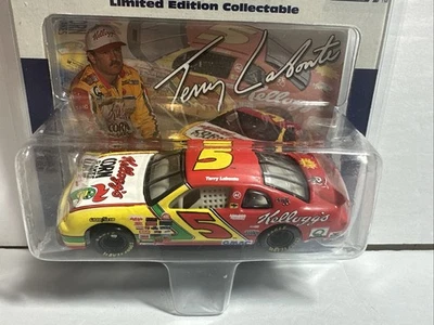 1996 Action 1/64 Terry Labonte Kellogg’s Monte Carlo Suzuka Japan - Image 1 of 4