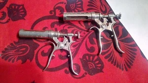 Two vintage stainless steel drug injection guns - Picture 1 of 12