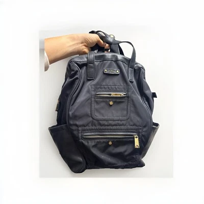 Bolso de Mano Tutilo New York Negro Nylon Imitación Cuero Tech Mochila Bolso de Bolsillo Acolchado Foto 1 de 4