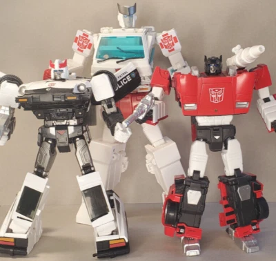 Transformers KO Masterpiece Figures- MP-30 Ratchet, MP-17 Prowl, MP-12 Sideswipe - Image 1 of 4