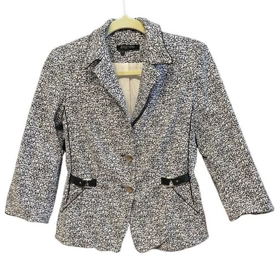 Chaqueta corta Etcetera estampado blanco y negro totalmente forrada talla 2 bolsillos delanteros Foto 1 de 4