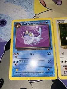 Pokémon TCG Dunkles Vaporeon 45/82 Team Rocket + Eevee 55/82 + 51/64 LP - Bild 1 von 11
