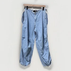 Jeans cargo BDG Urban Outfitters gamba a botte larghi donna piccoli denim lavaggio leggero - Foto 1 di 18