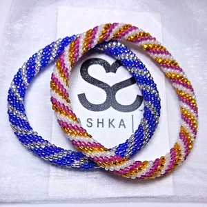 Par de Pulseras Sashka-Talla Original-Púrpura Puesta de Sol/Azul Pájaro de Fuego-Plata - Nuevas - Imagen 1 de 5