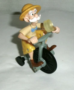 Disney Tarzan Porter Figur auf Dreirad - Bild 1 von 4