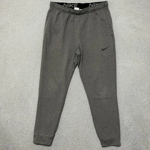 Nike Jogginghose Herren XL grau Dri-FIT Jogger sportlich Swoosh Logo Taschen - Bild 1 von 11