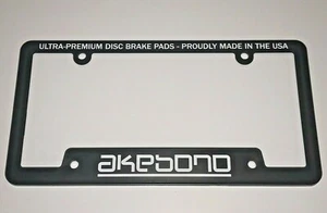 Black Plastic 4 Bolt Hole Akebono ProACT Disc Brake Pad License Plate Frames NEW - Picture 1 of 2