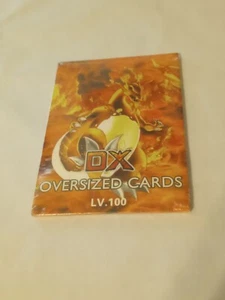 New Sealed Pokémon Oversized Large Cards DX LV. 100 English Pikachu Charzard. - Picture 1 of 2