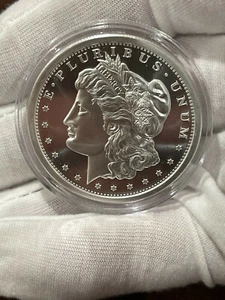 GSM Morgan Silver Dollar Round 1oz Troy .999 Fine Solid Silver Coin BU CAPSULE - Picture 1 of 2