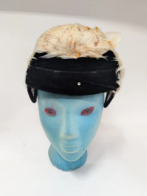 Diadema pluma medio sombrero vintage Foto 1 de 4