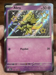 Pokemon TCG - Abra 148/91 - Paldean Fates - Baby Shiny - Picture 1 of 4