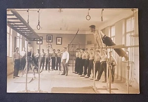 Real Photo Postcard RPPC~Czechoslovakia Men’s Gymnastics Team & Coach Inside Gym - Picture 1 of 3