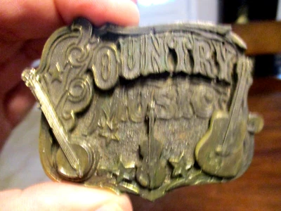 MÚSICA COUNTRY GUTAR BANJO VIOLÍN THE GREAT AMERICAN HEBILLA CO. 919sn Hebilla de cinturón Foto 1 de 4