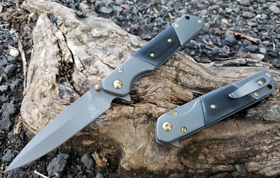 Тонкий пружинный карманный нож-флиппер деревянный черный и серый с лезвием EDC Tip Up  - Изображение 1 из 4