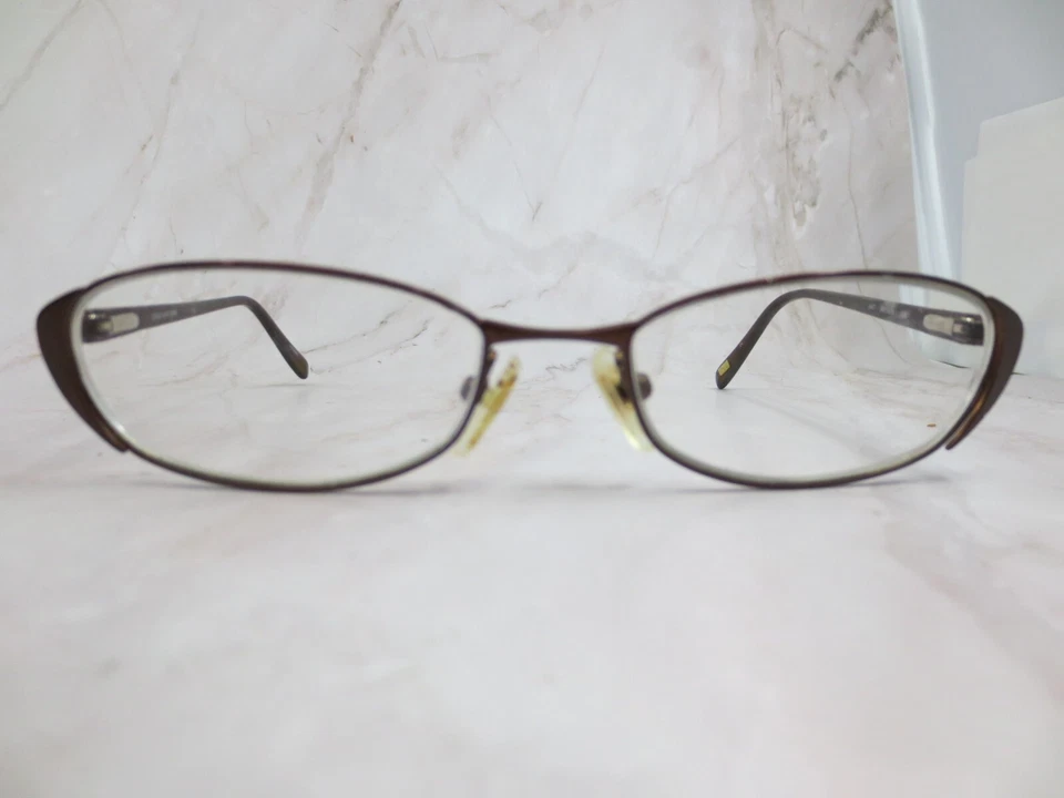 Marco de gafas Jones New York J447 unisex marrón metal ovalado medio borde 53-17-135 Foto 1 de 4