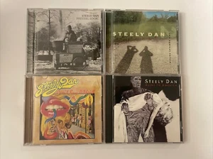 Steely Dan Cd Lot of 4 CDs. Pretzel Logic/Alive I’m America/can’t Buy A Thrill - Picture 1 of 3