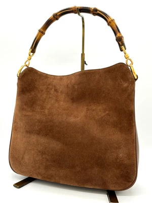 Auténtico bolso de mano Gucci de bambú de gamuza de cuero marrón Foto 1 de 4