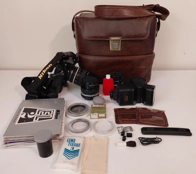 Lote de cámaras fotográficas Nikon EL2 35 mm 28, 52, 135 lentes, viento automático, pieza para ojos, etc. JAPÓN Foto 1 de 4