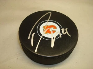Travis Hamonic Signed Calgary Flames Hockey Puck Autographed 1A - Picture 1 of 2