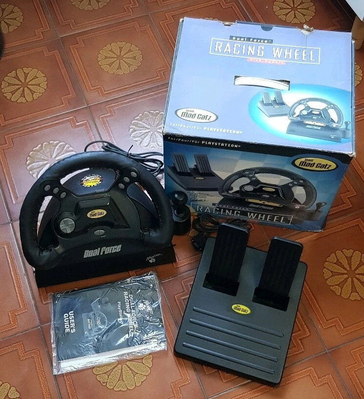 Volante con pedali Mad Catz Dual Force Racing Wheel per Playstation 1 PS1 PSX - Immagine 1 di 1