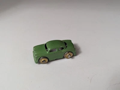 Mini coche de arcilla diecast diecast para transporte automático - pequeño sedán verde tostado/plateado ruedas Foto 1 de 3